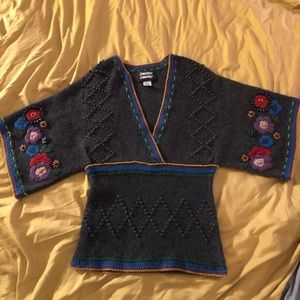 Sweater Sweater gray sweater with lots of flare